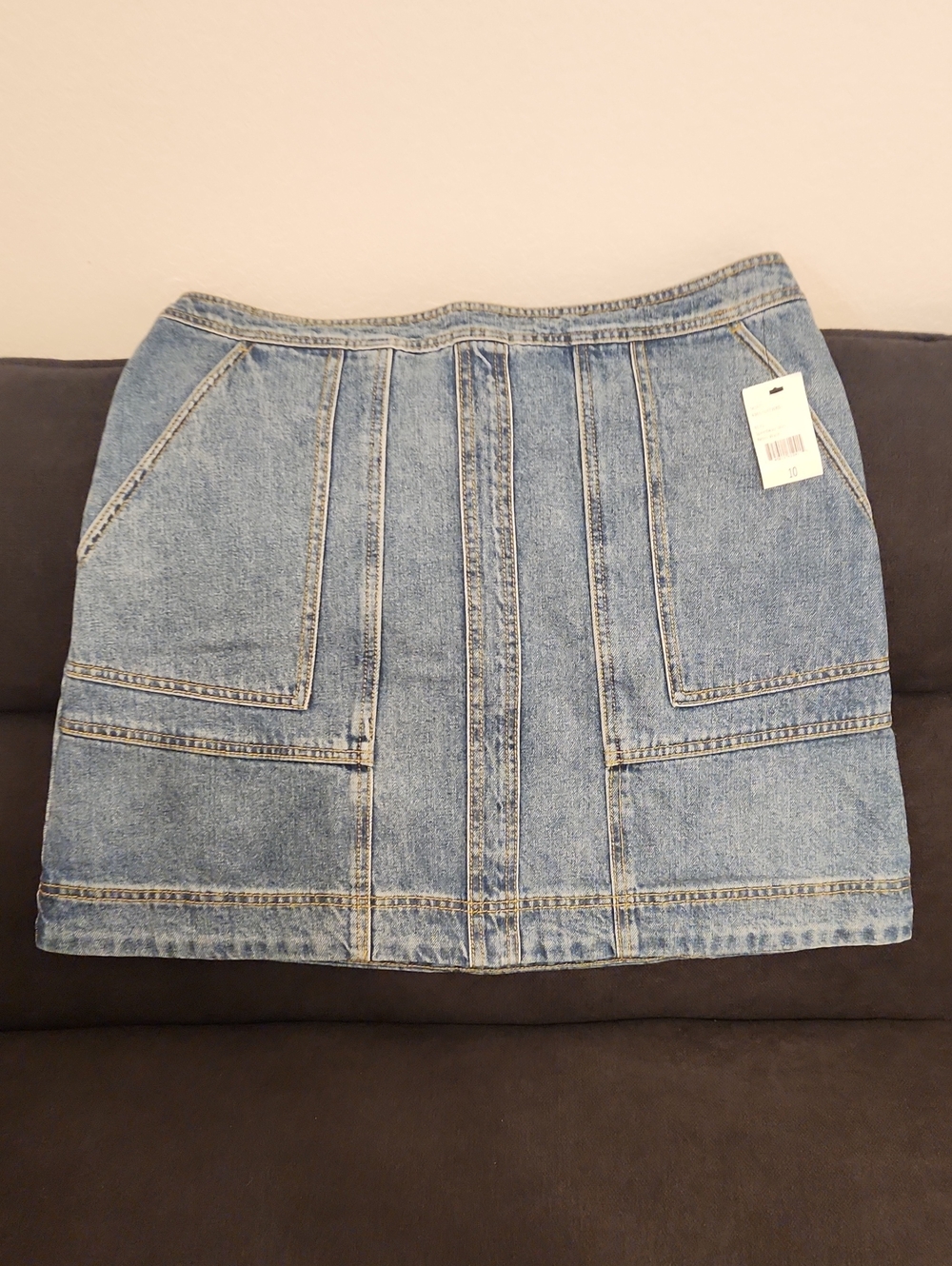 CAbi Light Blue Denim Mini Skirt with Front Paneling